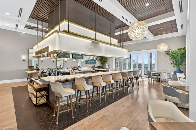 a dinning table and chairs in a room