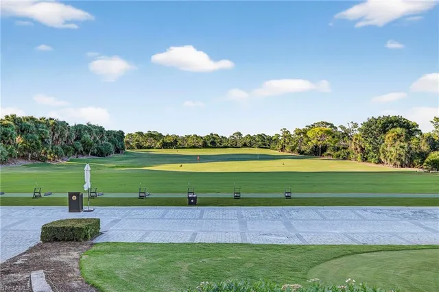 a view of a lake with a yard