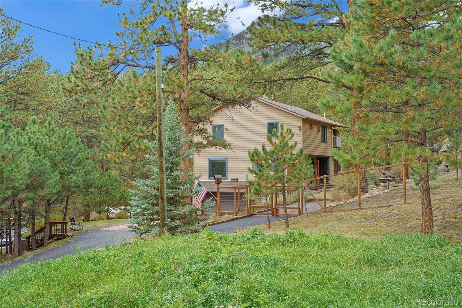 a view of a chair and table in the garden