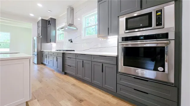 a bathroom with a sink toilet and mirror