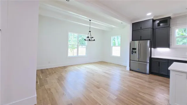 a bathroom with a shower and a bathtub