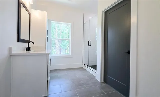 a view of a dining room with furniture and window