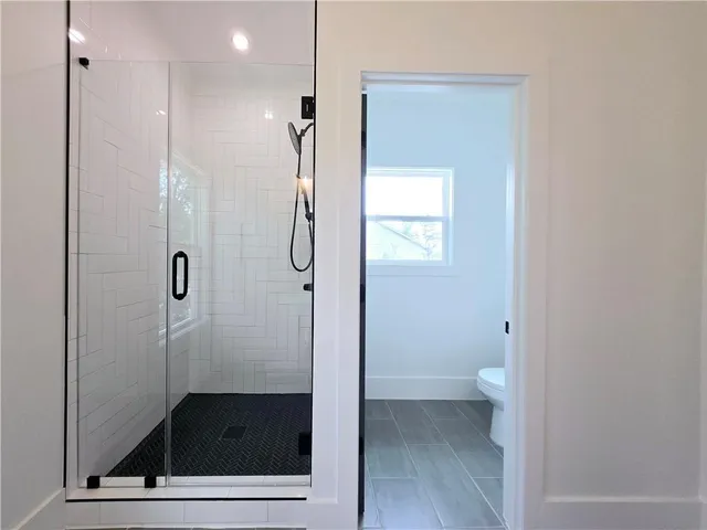 a view of a dining room with furniture and window