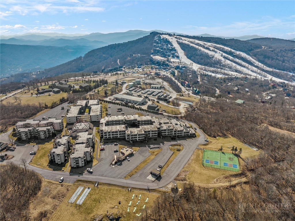 301 Pinnacle Inn Road, Unit 4103 Beech Mountain, NC 28604 - Photo 40 of 43 an aerial view of residential houses with outdoor space