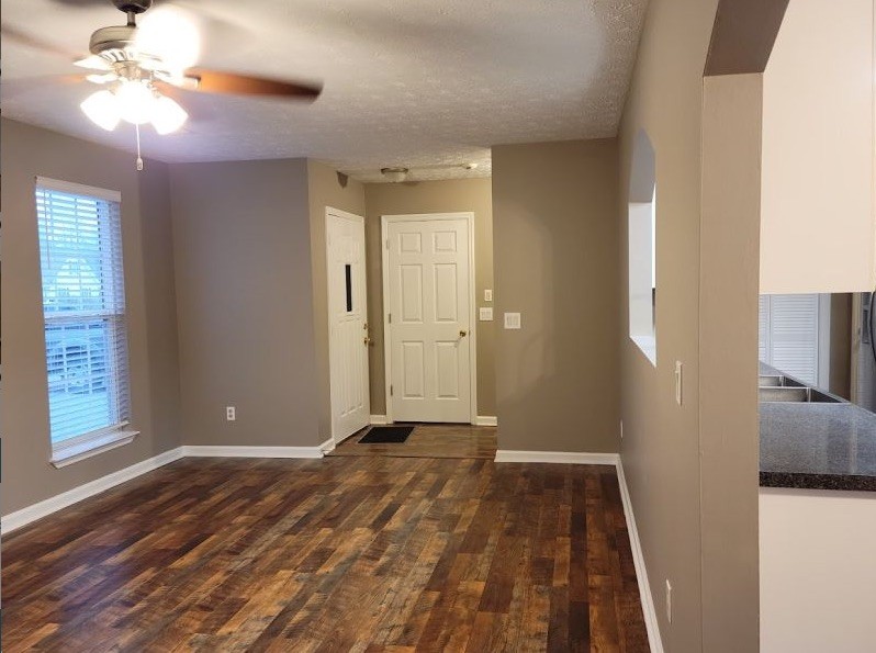 2006 Cody Drive Lebanon, TN 37087 - Photo 7 of 18 a view of a hallway with a chandelier fan and wooden floor
