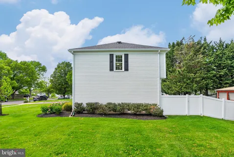 a view of a house with a garden