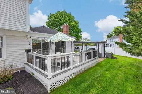a outdoor living space with furniture and garden view