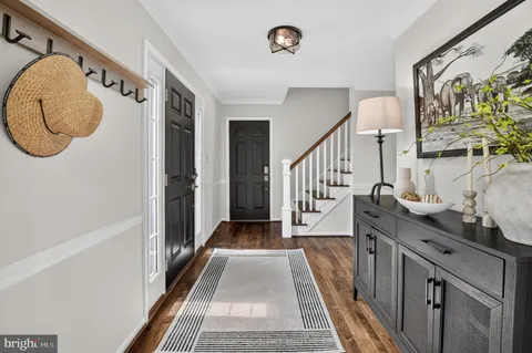 a view of a living room and hardwood floor