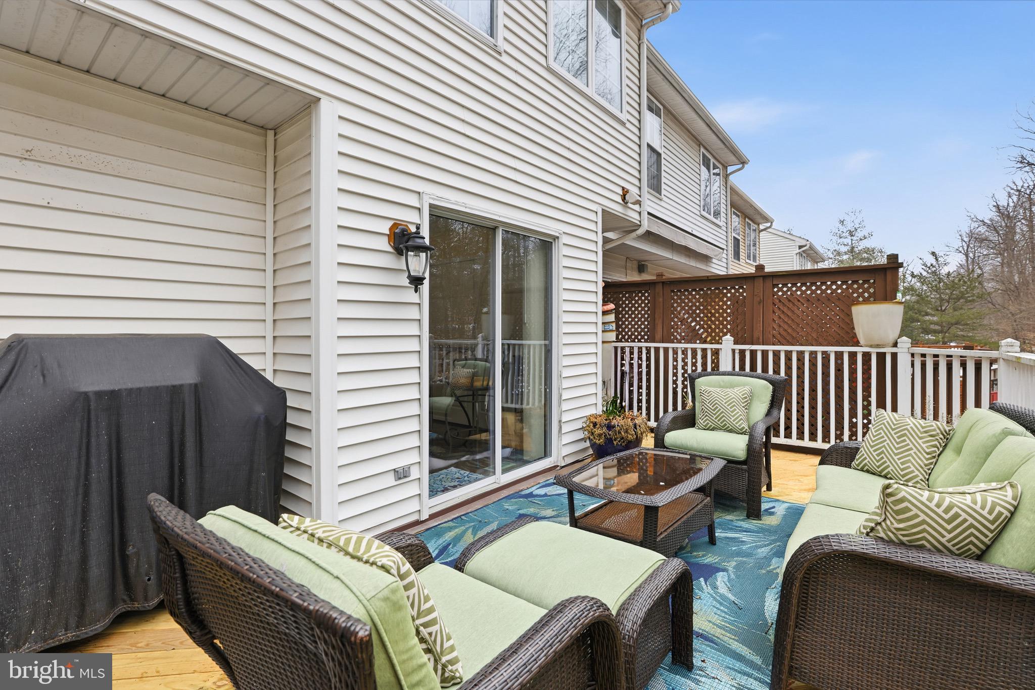 3045 Button Bush Lane Laurel, MD 20724 - Photo 18 of 28 a balcony with furniture and a window