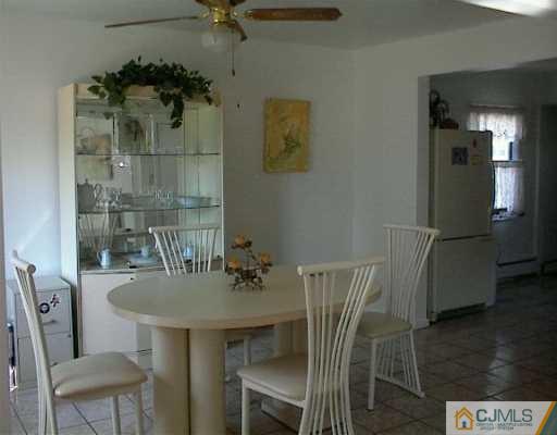 17 Colfax Road Edison, NJ 08817 - Photo 3 of 8 a dining room with furniture and window