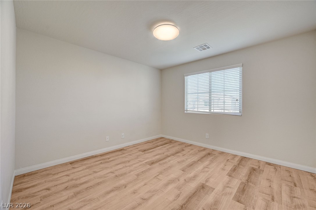 113 Elm Reed Avenue Las Vegas, NV 89113 - Photo 42 of 62 Unfurnished room with light wood-type flooring