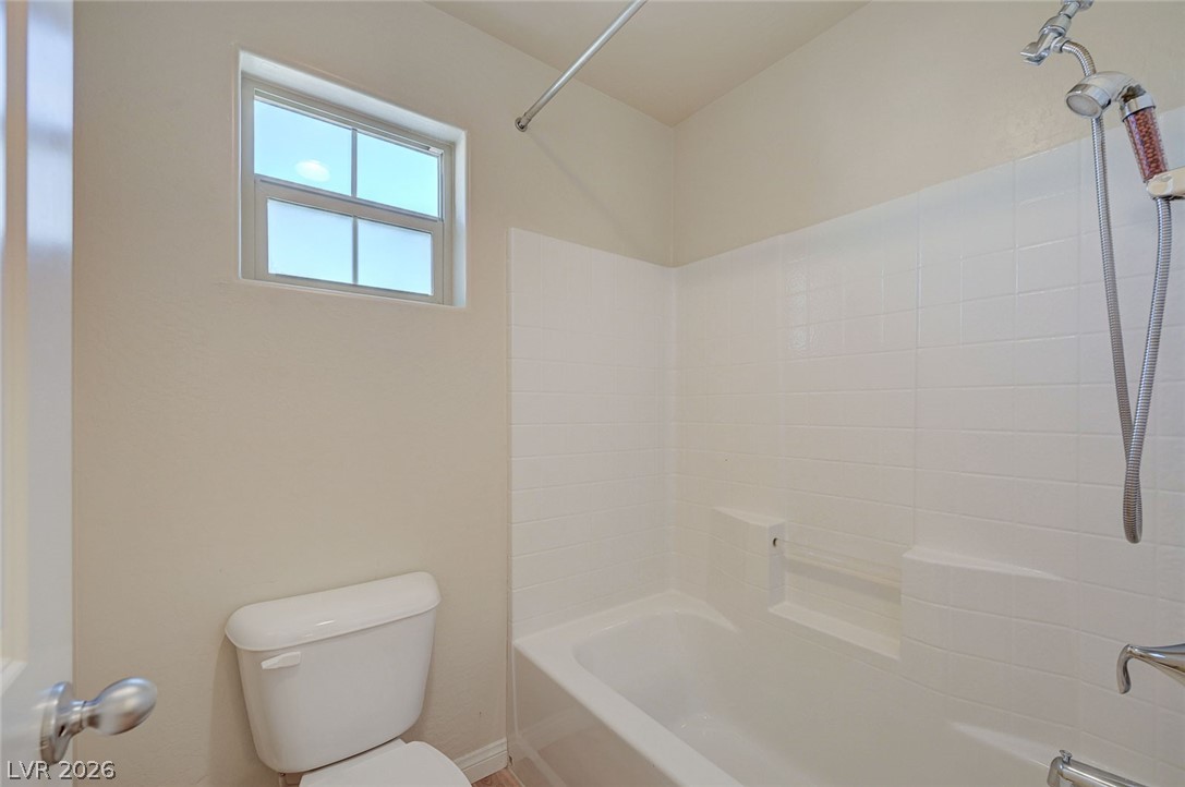 113 Elm Reed Avenue Las Vegas, NV 89113 - Photo 48 of 62 Full bathroom featuring tub / shower combination and toilet
