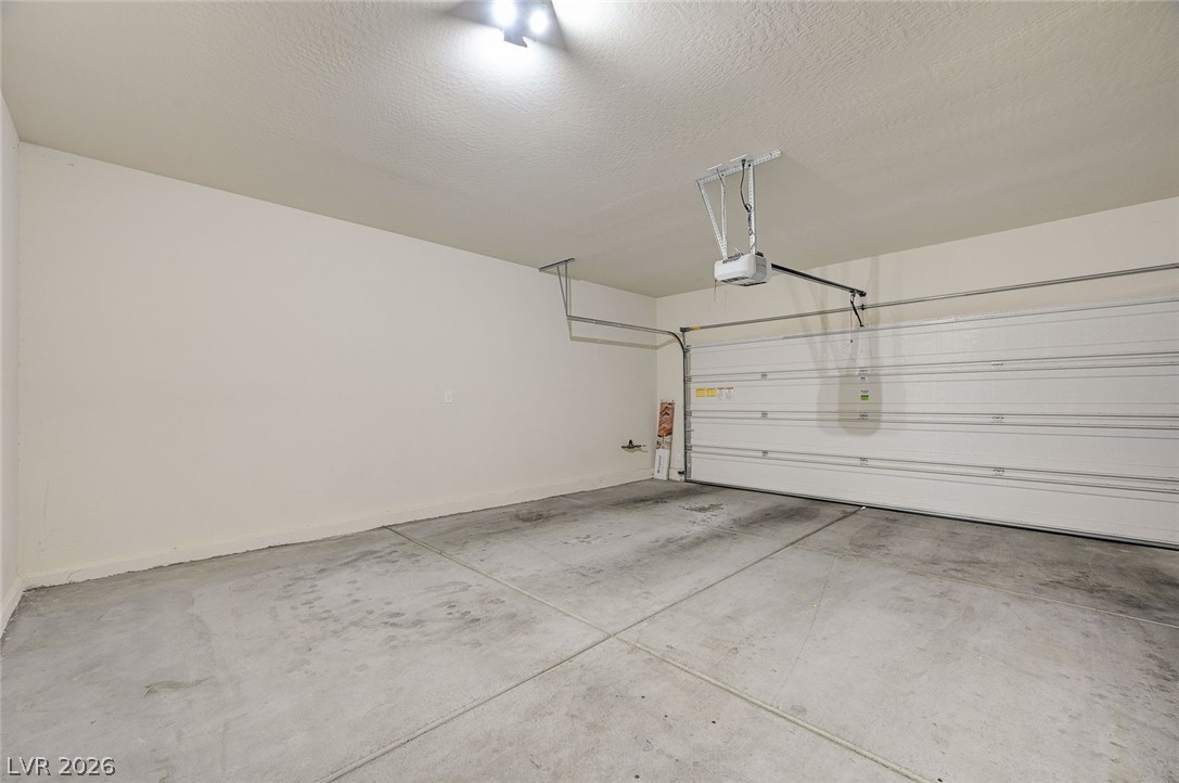 113 Elm Reed Avenue Las Vegas, NV 89113 - Photo 51 of 62 Garage with a garage door opener