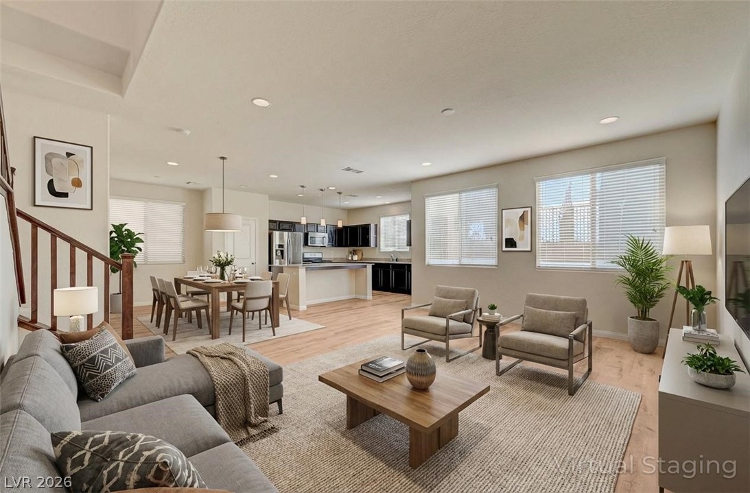 113 Elm Reed Avenue Las Vegas, NV 89113 - Photo 6 of 62 Living room with light wood-type flooring and recessed lighting