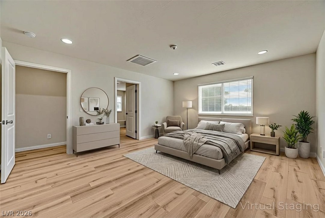 113 Elm Reed Avenue Las Vegas, NV 89113 - Photo 7 of 62 Bedroom with light wood finished floors and recessed lighting