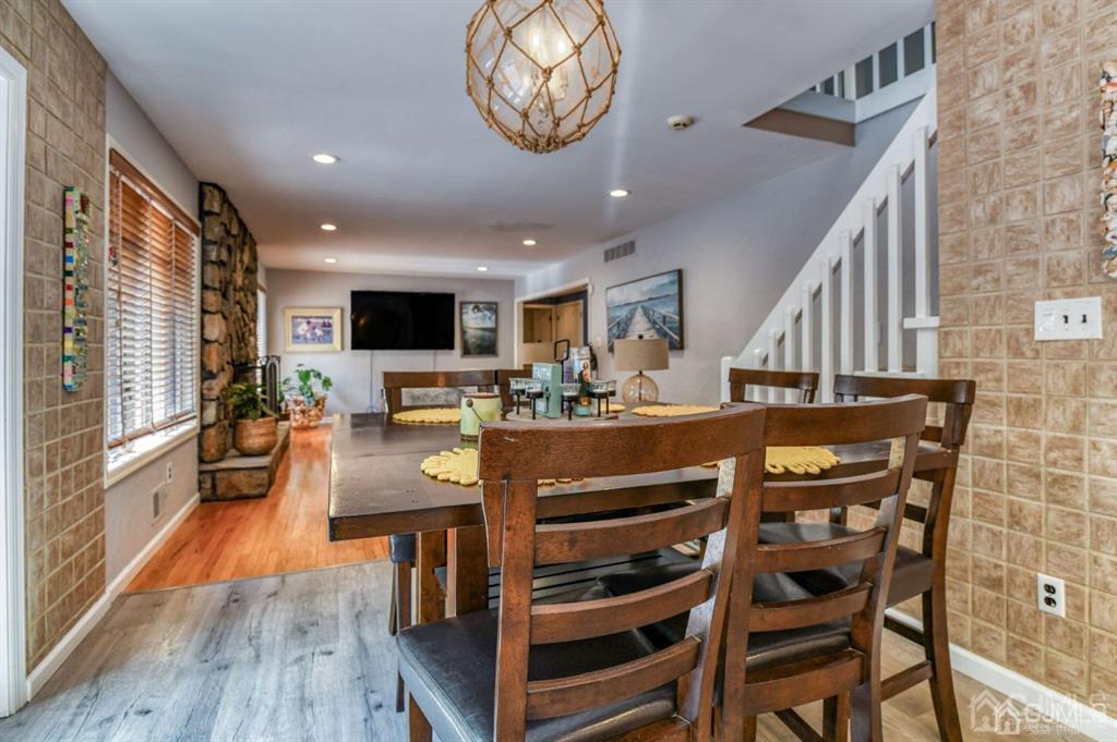 59 Friendship Road Cranbury, NJ 08512 - Photo 13 of 31 a view of a dining room with furniture window and wooden floor