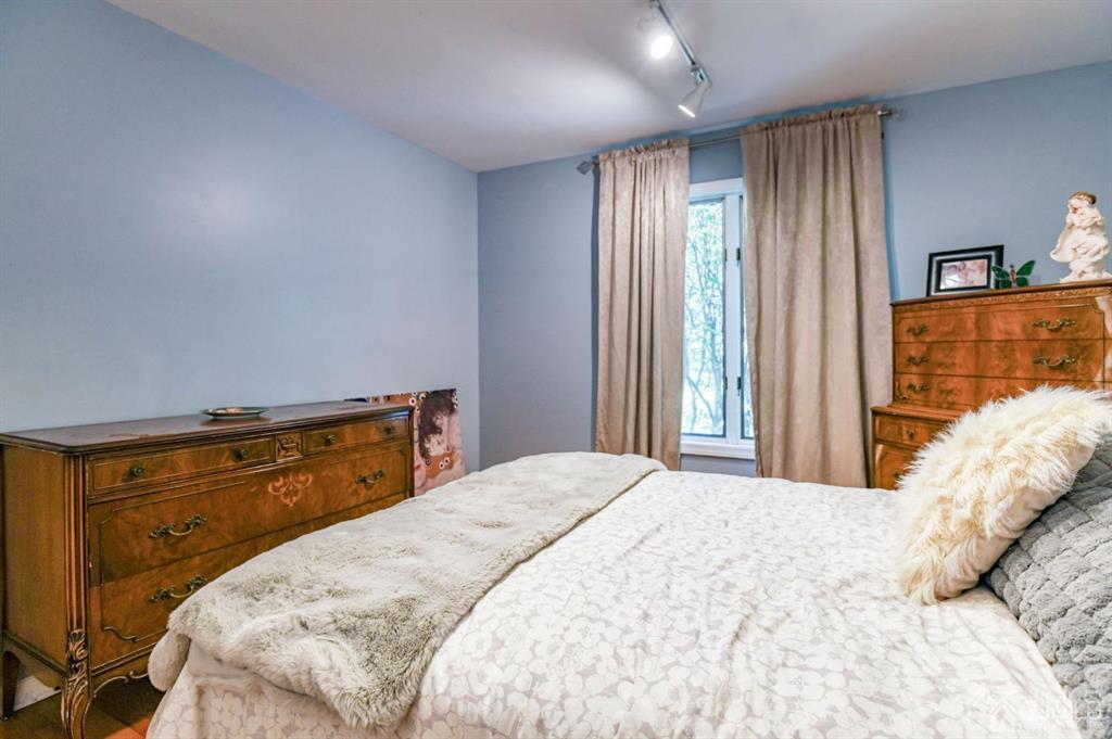 59 Friendship Road Cranbury, NJ 08512 - Photo 24 of 31 a bedroom with a bed and window