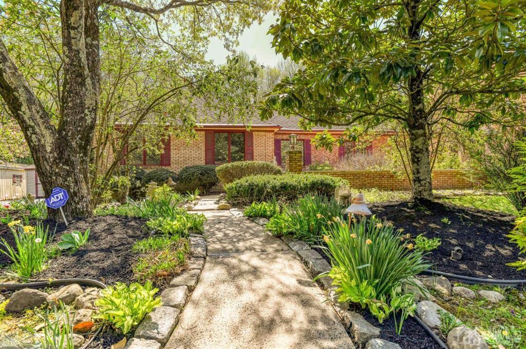 59 Friendship Road Cranbury, NJ 08512 - Photo 4 of 31 a view of backyard with potted plants and large trees