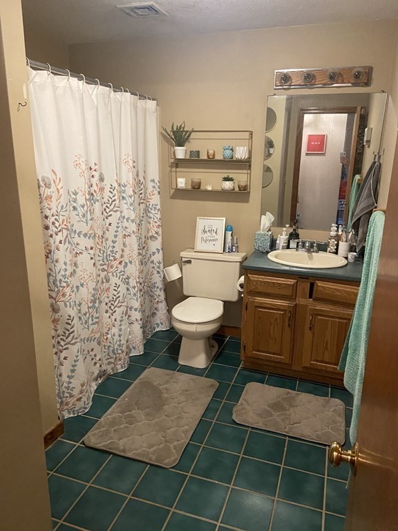 132 West Meadow Road, Unit 7 Haverhill, MA 01832 - Photo 7 of 12 a room with a toilet and a shower