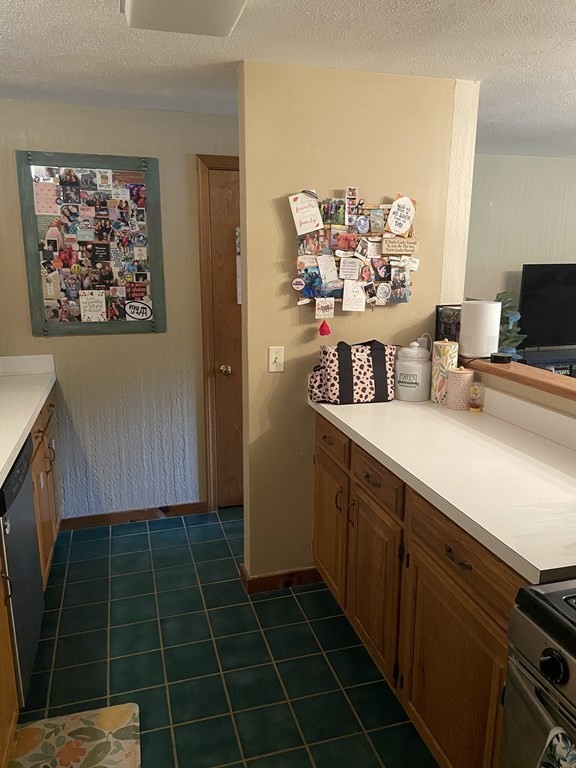 132 West Meadow Road, Unit 7 Haverhill, MA 01832 - Photo 8 of 12 a bathroom with a sink a vanity and a mirror