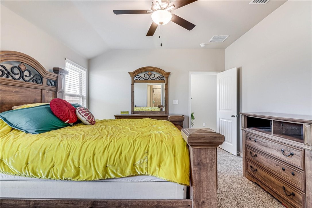 7630 Shadow Rider Lane Corpus Christi, TX 78414 - Photo 23 of 39 a bedroom with a bed and dresser