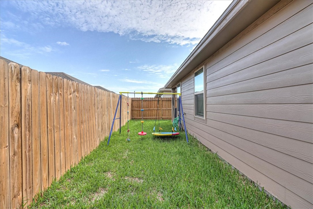 7630 Shadow Rider Lane Corpus Christi, TX 78414 - Photo 37 of 39 a view of a backyard with potted plants