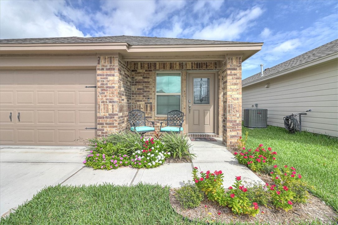 7630 Shadow Rider Lane Corpus Christi, TX 78414 - Photo 39 of 39 a front view of a house with a yard