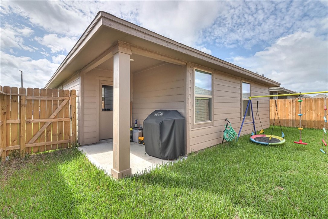 7630 Shadow Rider Lane Corpus Christi, TX 78414 - Photo 5 of 39 a front view of a house with garden