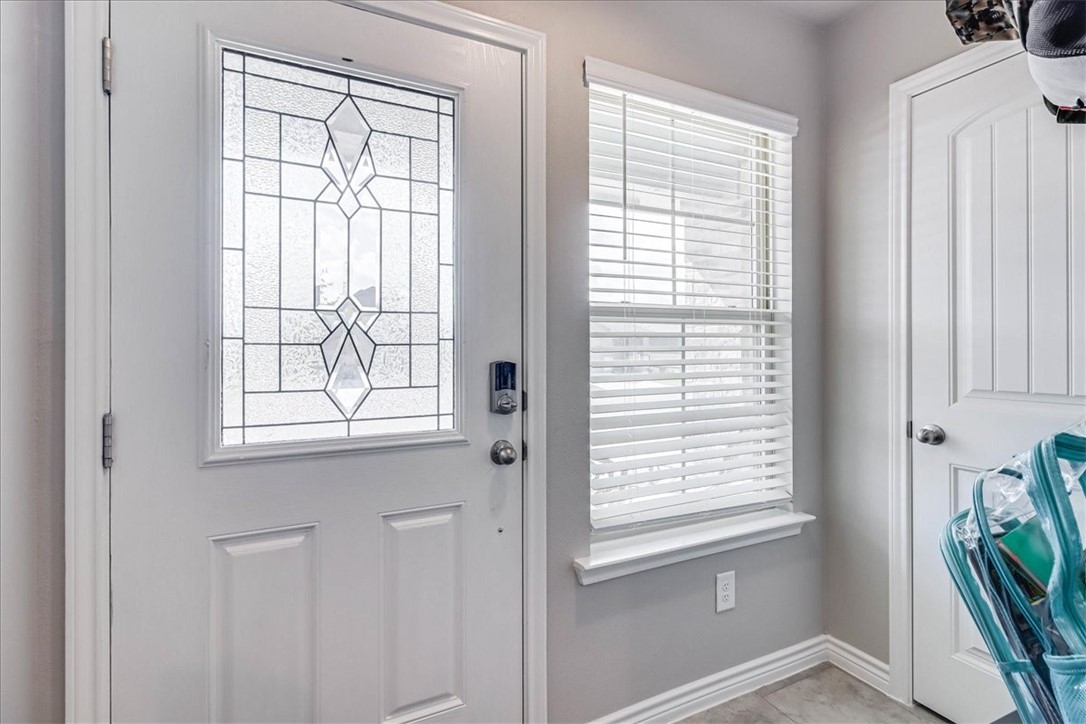 7630 Shadow Rider Lane Corpus Christi, TX 78414 - Photo 6 of 39 a view of an entryway with a window