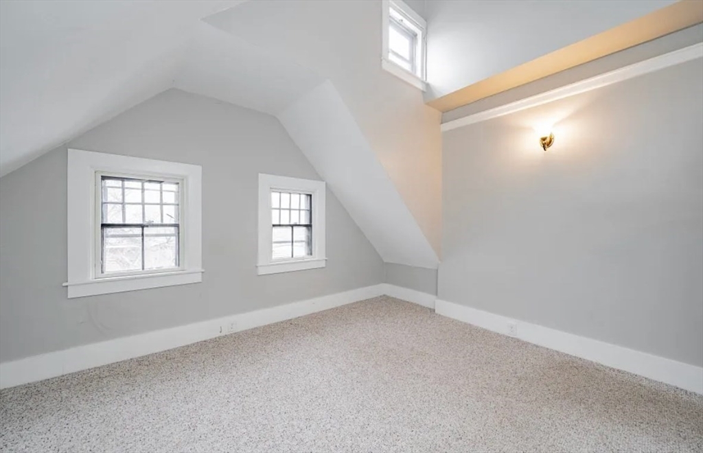 1137 Dwight Street, Unit C Holyoke, MA 01040 - Photo 5 of 9 an empty room with windows