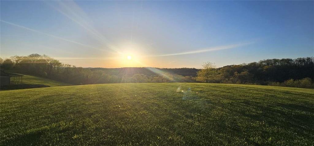 a view of an ocean from a mountain