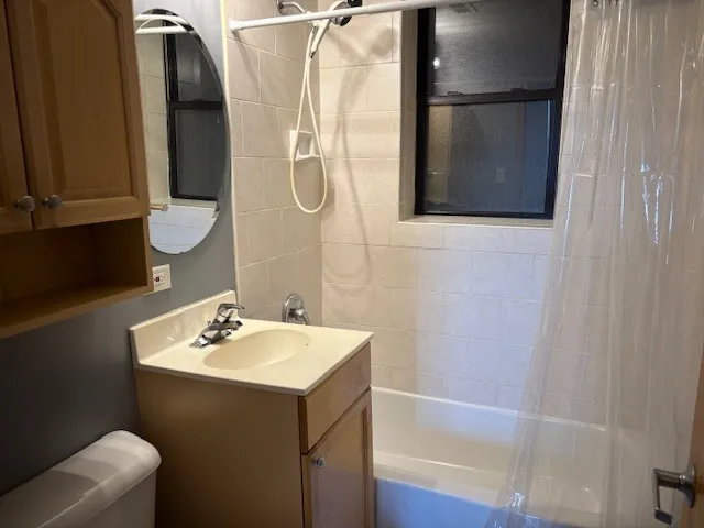 a bathroom with a sink and mirror