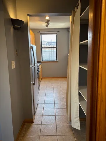 a view of closet and bathroom