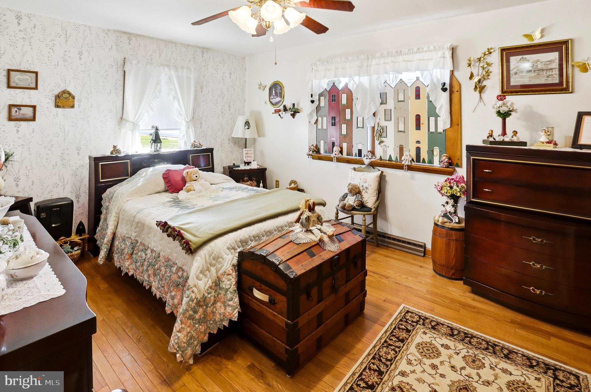 643 West 3rd Street Birdsboro, PA 19508 - Photo 11 of 28 a bed room with a bed and a dresser