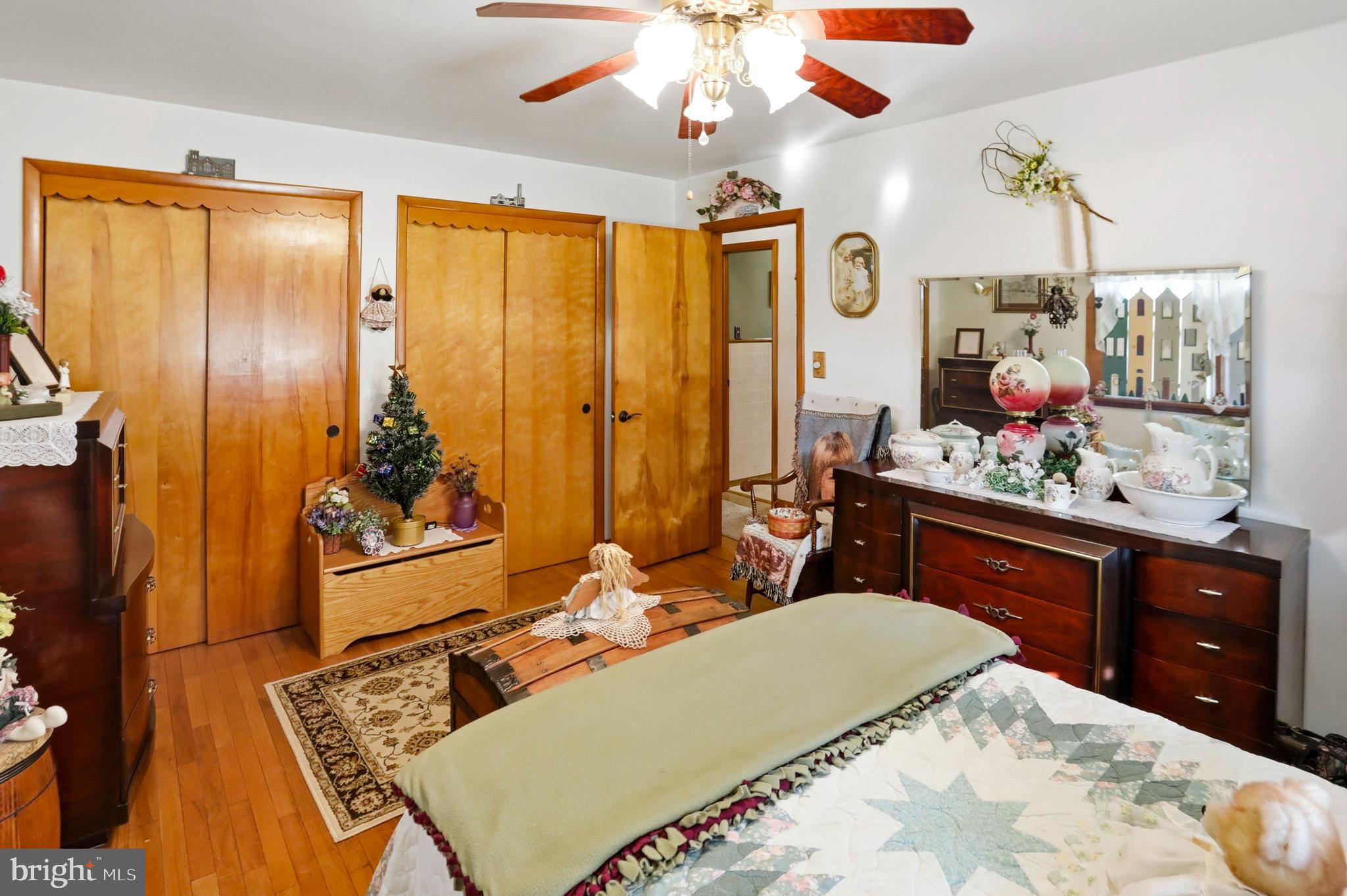 643 West 3rd Street Birdsboro, PA 19508 - Photo 12 of 28 a bed room with a bed mirror and a window