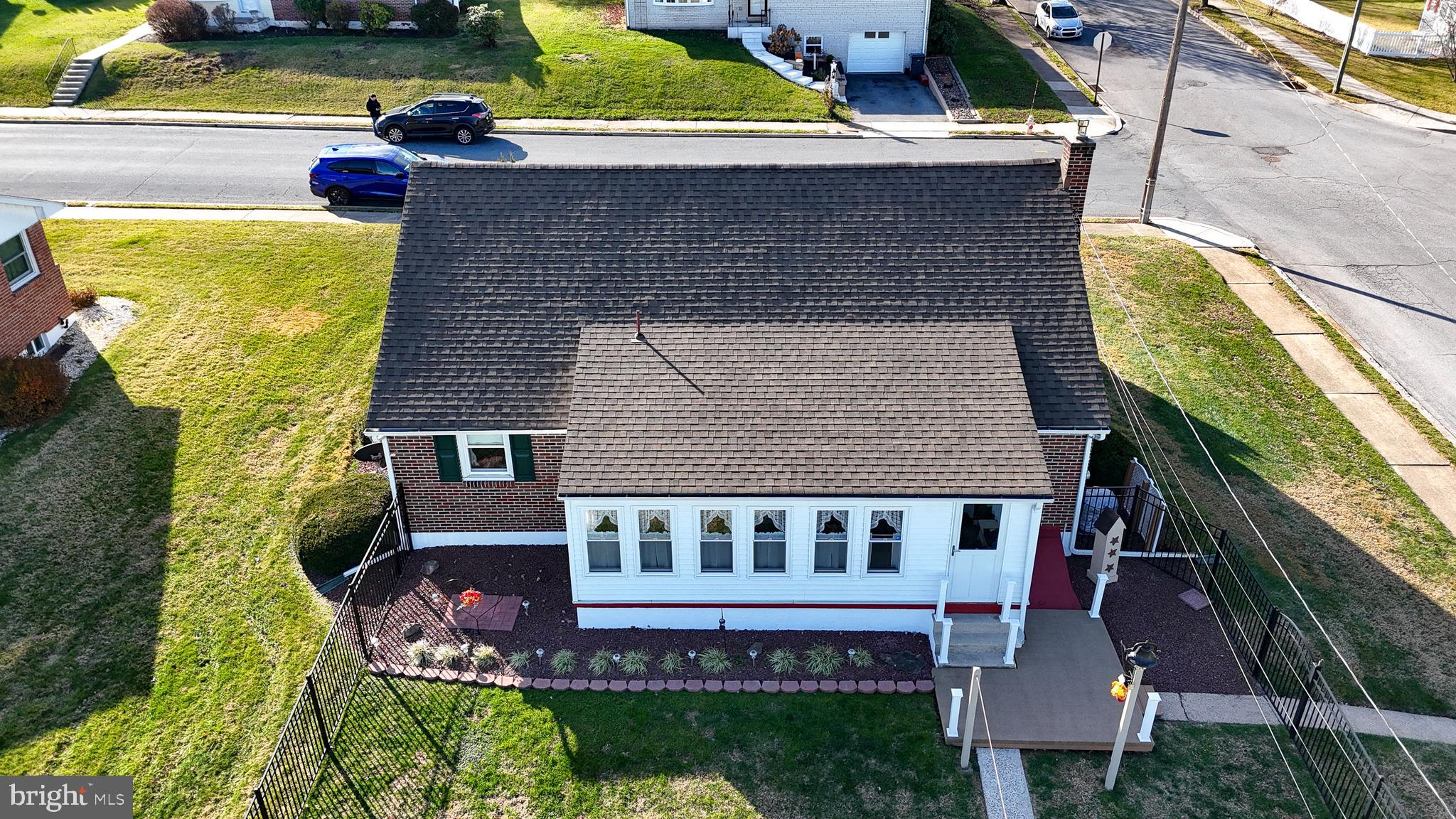 643 West 3rd Street Birdsboro, PA 19508 - Photo 28 of 28 an aerial view of a house with swimming pool and large trees