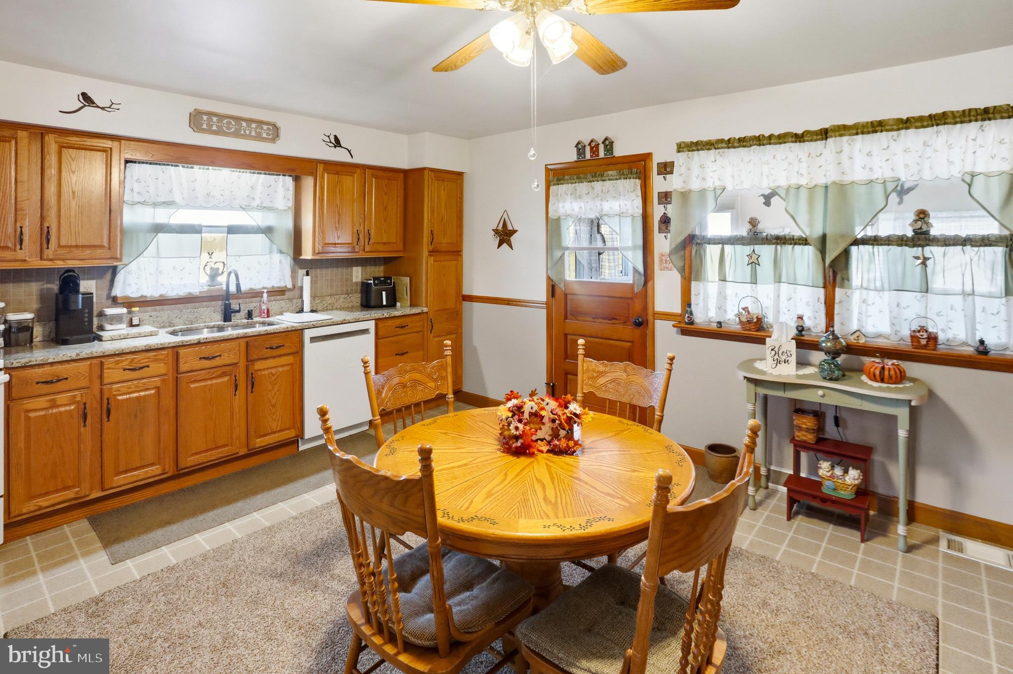643 West 3rd Street Birdsboro, PA 19508 - Photo 8 of 28 a view of a dining room with furniture and window