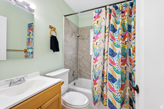 676 South 500 West Provo, UT 84601 - Photo 19 of 29 Bathroom with vanity and shower / bath combination with curtain
