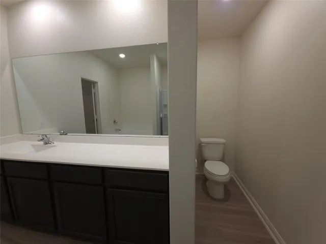 a bathroom with a sink and a toilet
