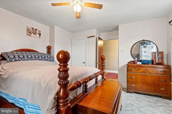 a living room with a bed