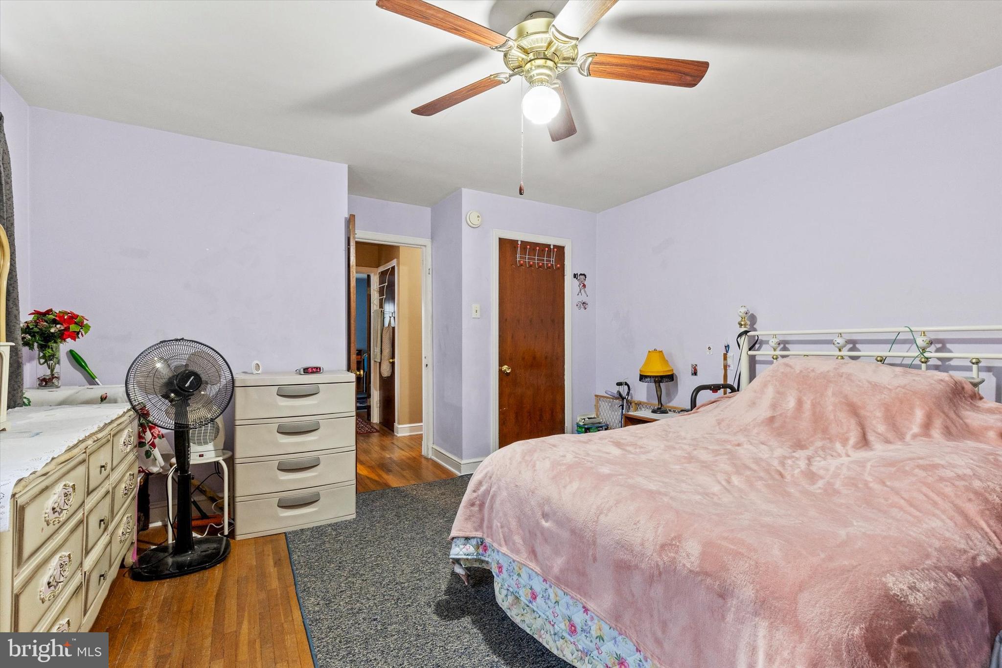 33 North Adams Street York, PA 17404 - Photo 19 of 42 a bedroom with a bed and a chandelier