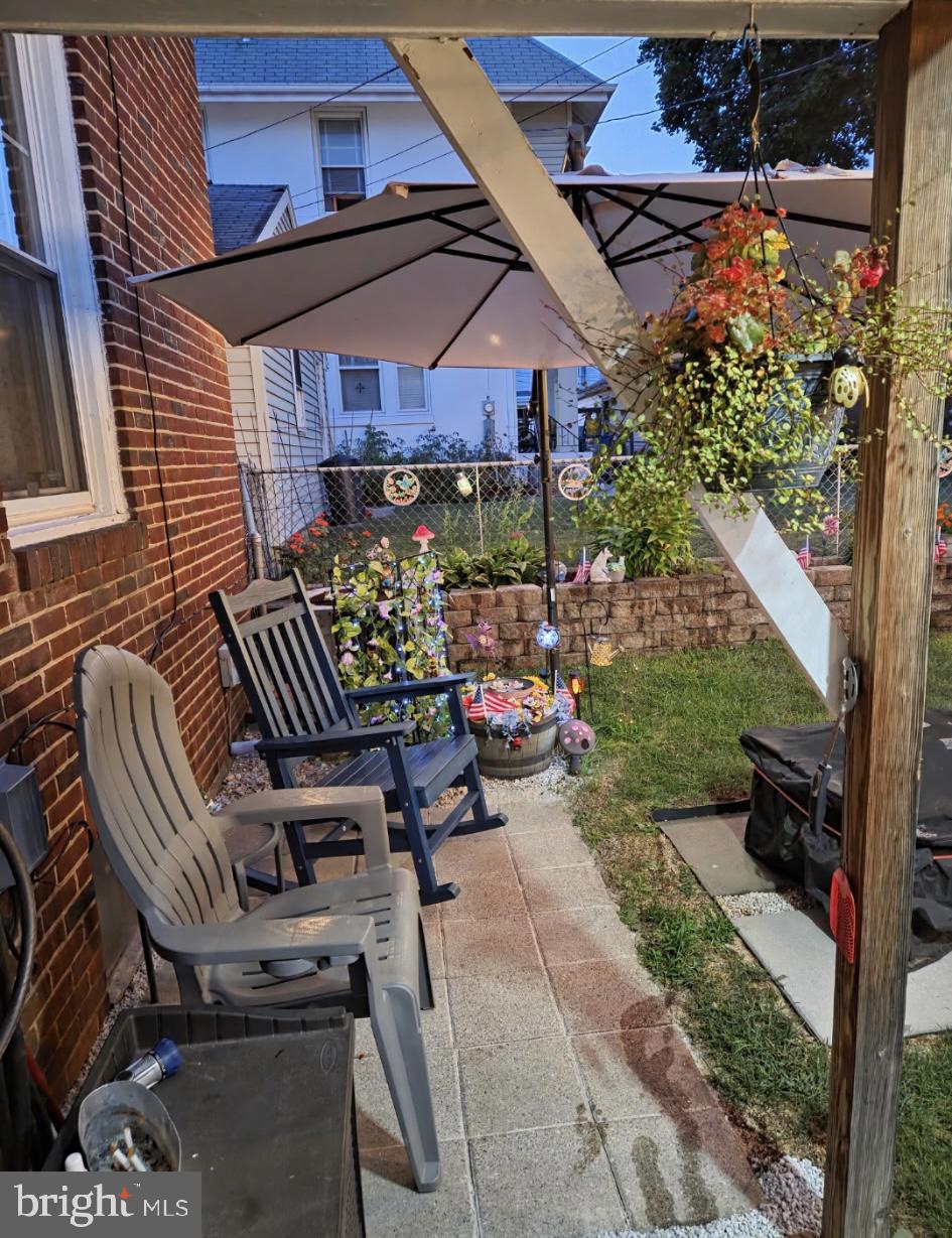 33 North Adams Street York, PA 17404 - Photo 36 of 42 a view of a chairs and table in backyard