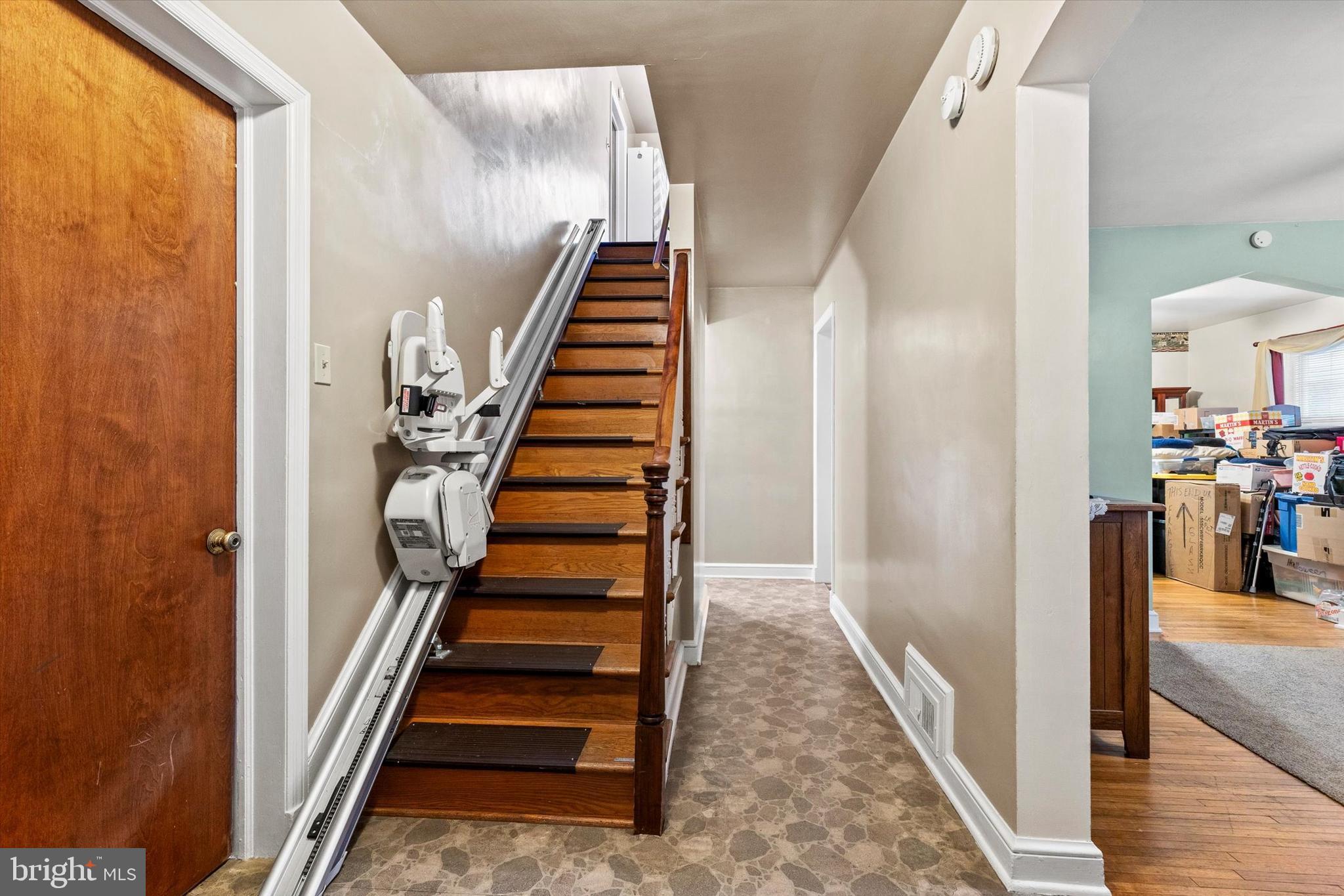 33 North Adams Street York, PA 17404 - Photo 5 of 42 a view of entryway and hall with wooden floor