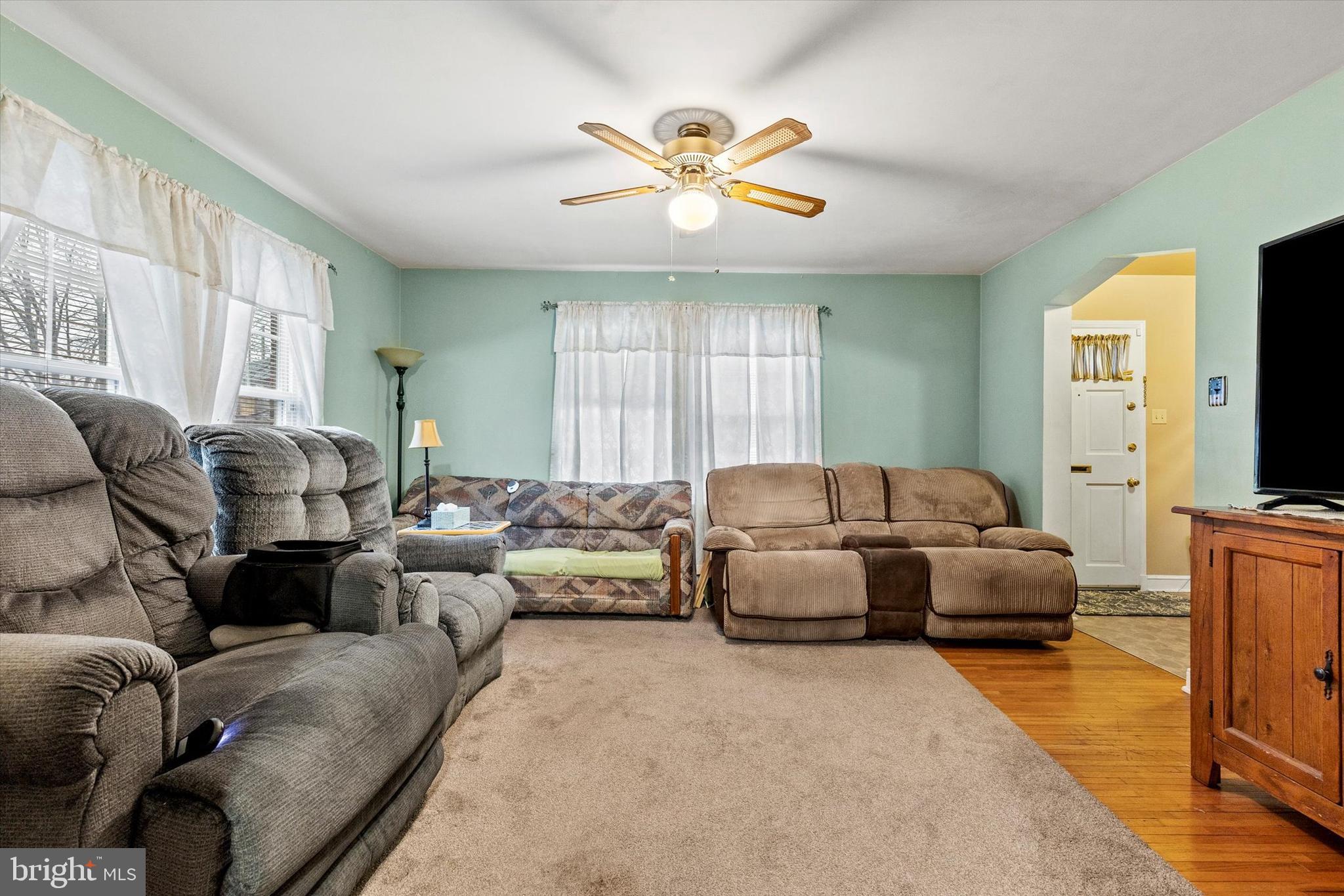 33 North Adams Street York, PA 17404 - Photo 7 of 42 a living room with furniture and a flat screen tv