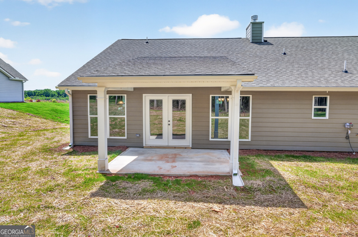 206 Airport Road, Unit 11 Canon, GA 30520 - Photo 3 of 34 a view of a house with backyard porch and sitting area
