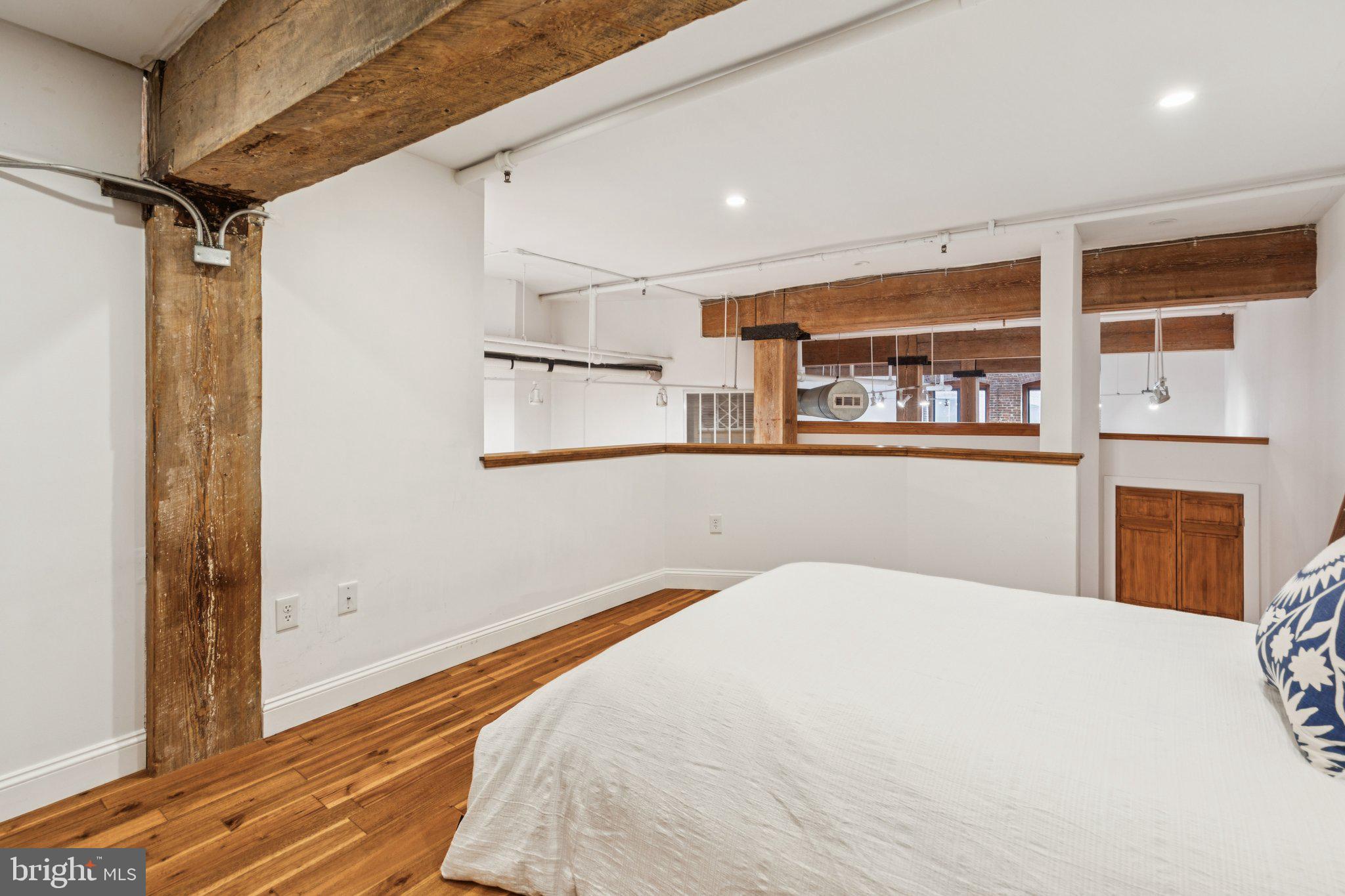 428 North 13th Street, Unit 3F Philadelphia, PA 19123 - Photo 20 of 48 a bedroom with a bed and a large window