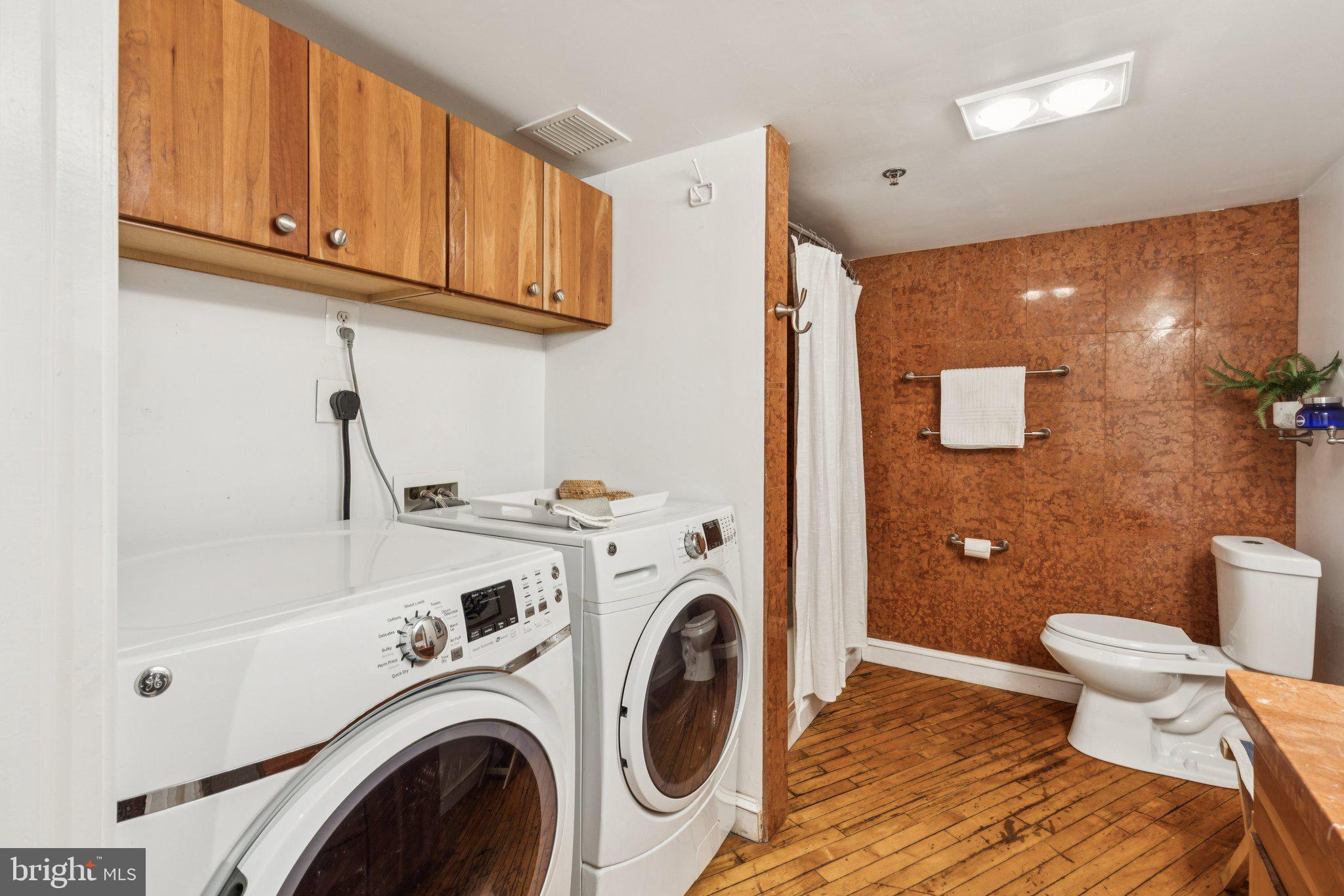 428 North 13th Street, Unit 3F Philadelphia, PA 19123 - Photo 26 of 48 a view of bathroom with toilet and washing machine
