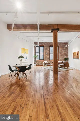 a kitchen with stainless steel appliances granite countertop a stove and cabinets