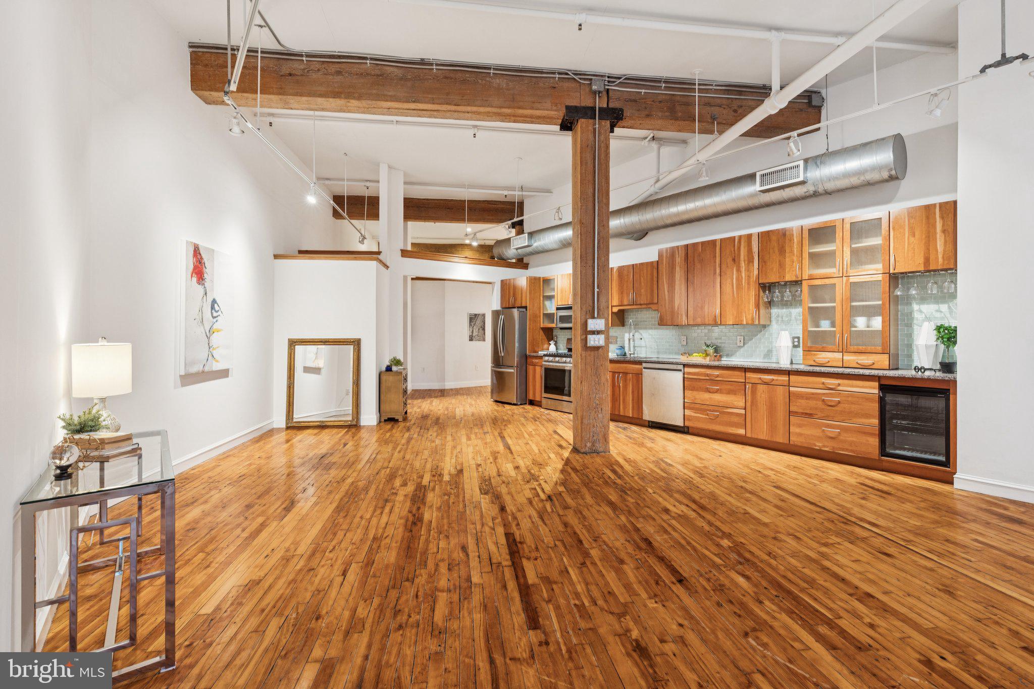 428 North 13th Street, Unit 3F Philadelphia, PA 19123 - Photo 34 of 48 a view of kitchen with furniture and wooden floor