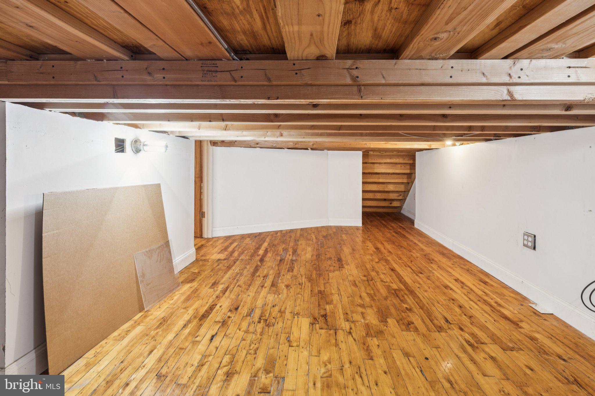 428 North 13th Street, Unit 3F Philadelphia, PA 19123 - Photo 43 of 48 a view of a room with wooden floor